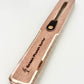 The FinEase wooden surfboard fin puller tool with leather protection strip