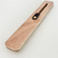 The FinEase wooden surfboard fin puller tool with leather protection strip