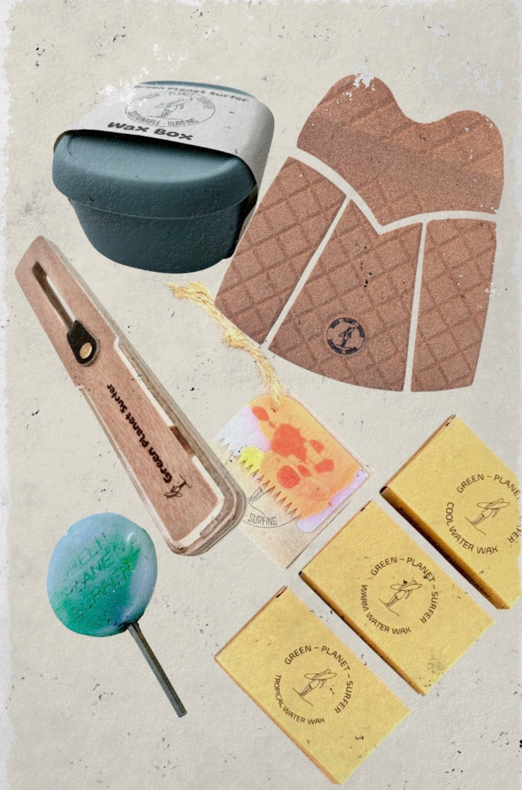 Collection of eco-friendly products including a small container, clove, and soap bars on a textured surface.